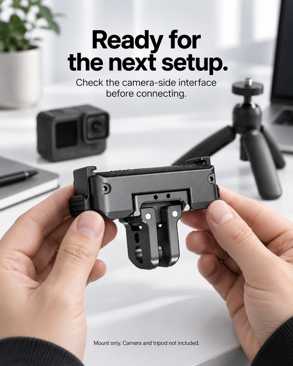 Creator preparing a compact mount beside a separate camera and tripod; camera and tripod are not included.