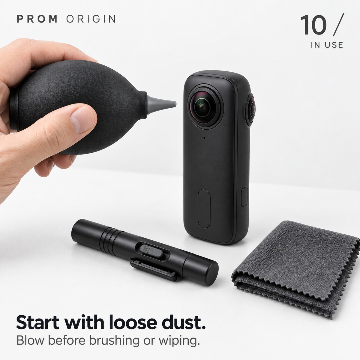 Manual air blower used to remove loose dust from a 360 camera lens